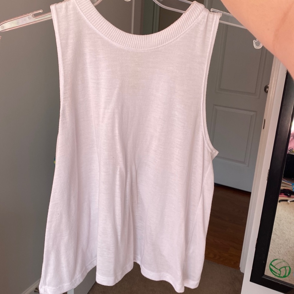White, loose-fit, tank top w/ open back